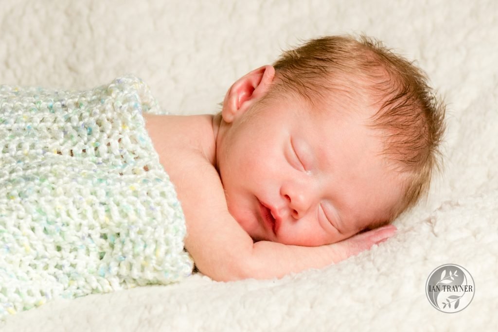 Newborn baby photography. Very cute sleeping baby.