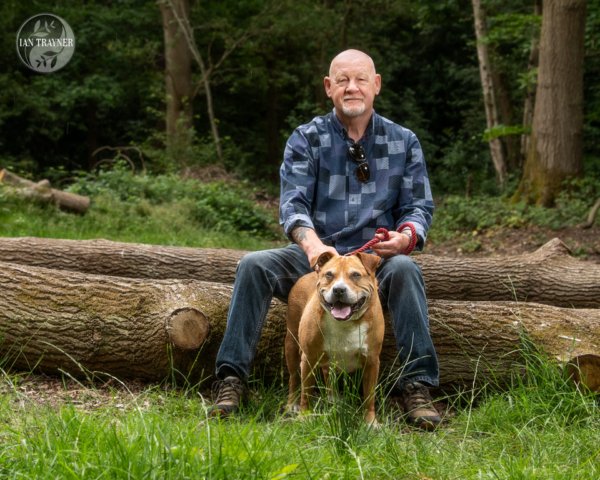 man and his dog - photo portrait outdoors