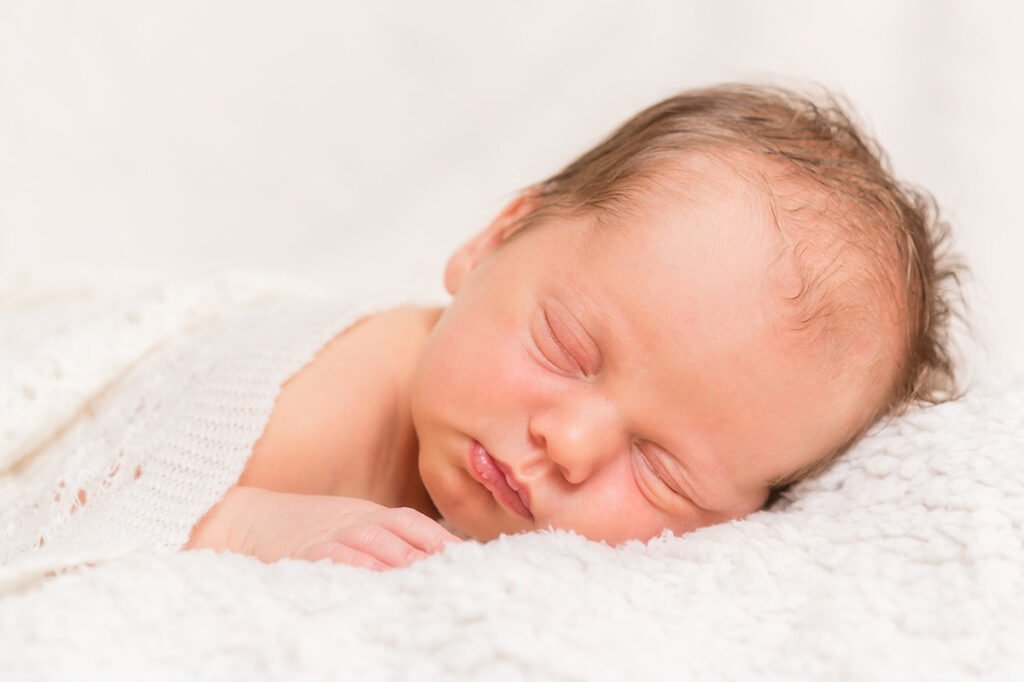 newborn photoshoot, cute baby fast asleep